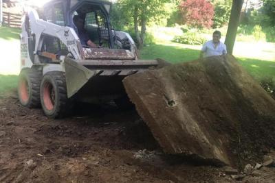 Cracked Driveway Removal with Bobcat Fairfax VA